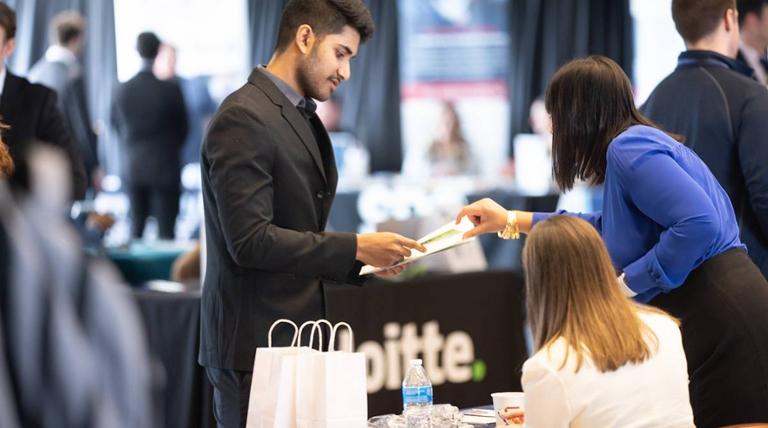 Monarch University  student talking with an employer