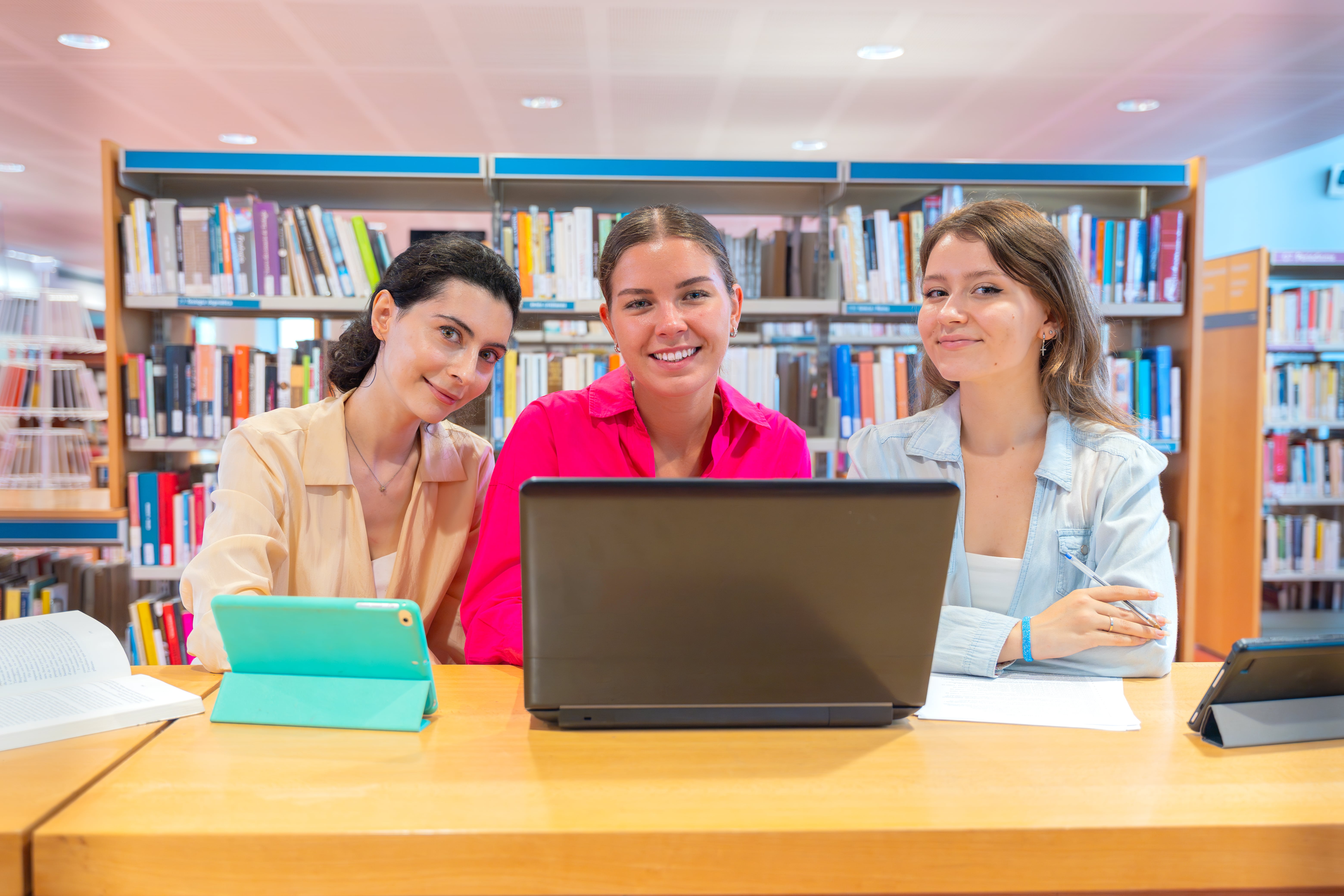 Monarch student working in library with faculty member