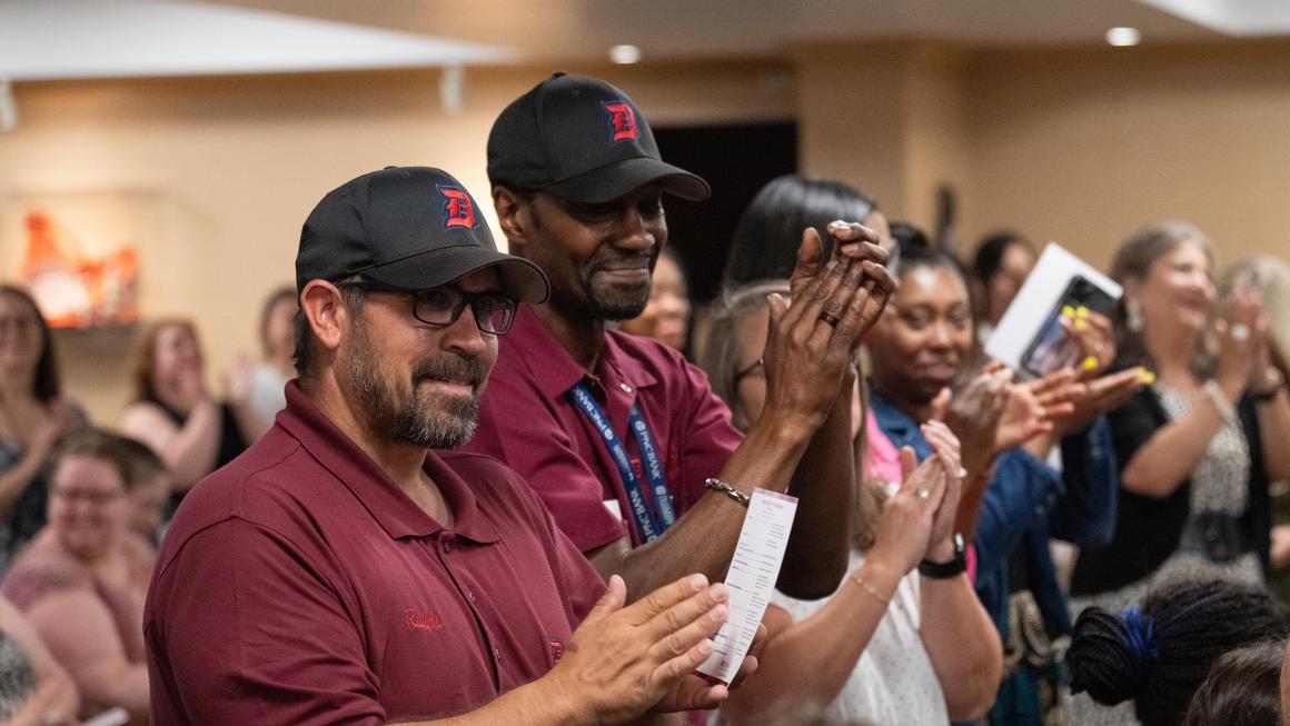 Monarch's dining staff claps during the steel drum performance at Juneteenth 2024.